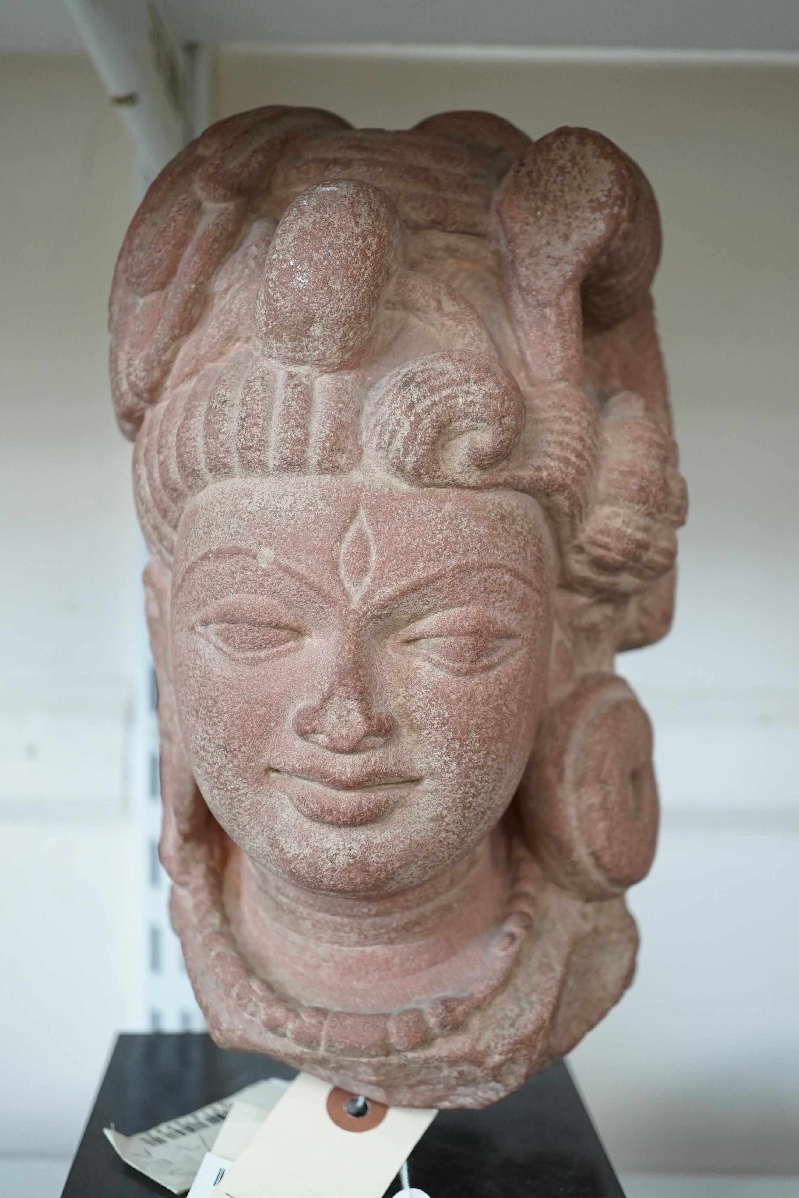 A red stone head of Ardhanarishvara, Muthura region, India, Gupta period, c.5th century A.D.